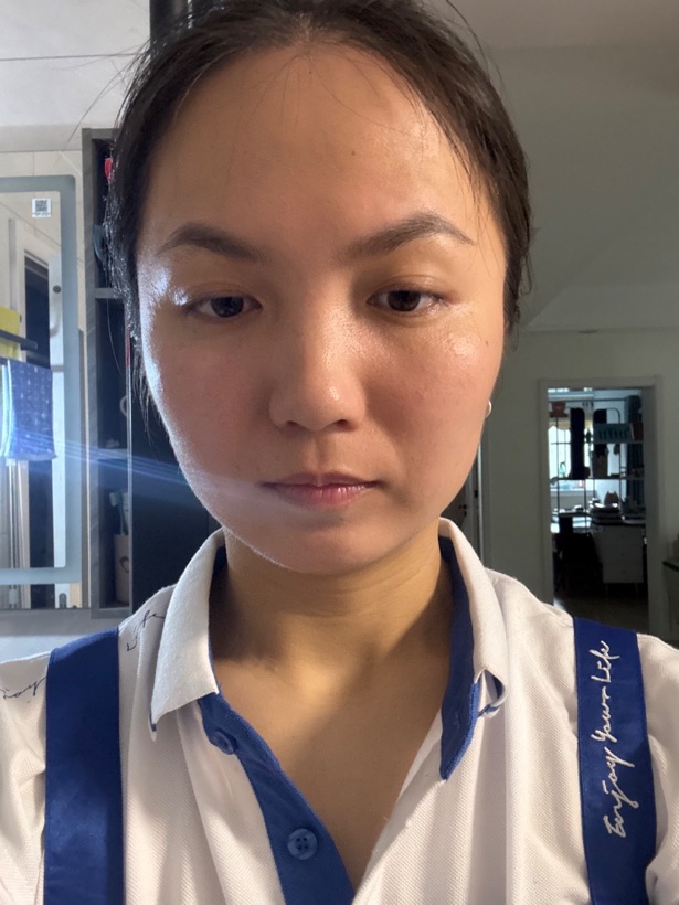 Uploaded selfie with uneven lighting before AI generation